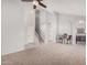 Bright living room with vaulted ceilings, neutral carpet, and tiled entryway at 640 W Country Estates Ave, Gilbert, AZ 85233