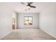 The main bedroom offers natural light and neutral walls with views of the neighborhood at 640 W Country Estates Ave, Gilbert, AZ 85233