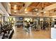 Well-equipped fitness center with modern exercise machines and natural light at 6936 E Snowdon St, Mesa, AZ 85207