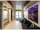 Inviting lobby featuring a water feature, modern art, and a comfortable seating area at 6936 E Snowdon St, Mesa, AZ 85207