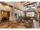 Spacious lobby featuring high ceilings, stone accents, and comfortable seating at 6936 E Snowdon St, Mesa, AZ 85207
