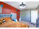 Stylish bedroom with a playful design featuring a quirky color scheme and fun decor at 7725 W Dreyfus Dr, Peoria, AZ 85381