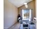 Cozy dining room with table near the window allowing for abundant natural light at 7725 W Dreyfus Dr, Peoria, AZ 85381