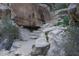 Picturesque hiking trail with stone steps winding through natural rock formations and greenery at 7725 W Dreyfus Dr, Peoria, AZ 85381