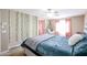 Bright bedroom with soft lighting, decorated with hanging plants, and a cozy hammock chair at 813 E Agua Fria Ln, Avondale, AZ 85323