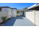 A cozy backyard patio provides a private outdoor space with access to the home through sliding glass doors at 8341 E Keim Dr, Scottsdale, AZ 85250