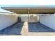 Covered carport parking provides protection from the elements with ample space for vehicles and street number at 8341 E Keim Dr, Scottsdale, AZ 85250
