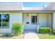 Quaint home exterior with manicured shrubs, clearly displayed address, and a welcoming front porch area at 8341 E Keim Dr, Scottsdale, AZ 85250