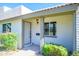 Charming home exterior with a well-maintained front yard, inviting entrance, and clear house number display at 8341 E Keim Dr, Scottsdale, AZ 85250