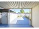 Covered patio overlooking a private backyard with desert landscaping at 8341 E Keim Dr, Scottsdale, AZ 85250