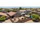 Aerial view of home featuring a covered patio, pergola and pool in the backyard at 878 E Mountain View Rd, San Tan Valley, AZ 85143
