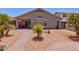 Home features covered patio and landscaped backyard with pergola and patio at 878 E Mountain View Rd, San Tan Valley, AZ 85143