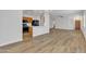 Inviting living space adjacent to the kitchen with modern finishes at 9261 W Sheridan St, Phoenix, AZ 85037