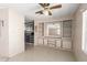 Dining room with built-in cabinets and mirror, adjacent to the kitchen at 9347 E Edgewood Ave, Mesa, AZ 85208
