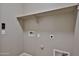 Laundry room featuring a shelf and washer/dryer hookups at 9437 W Georgia Ave, Glendale, AZ 85305