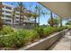 A patio with views of lush greenery, palms, and a shaded gazebo at 945 E Playa Del Norte Dr # 1016, Tempe, AZ 85288