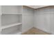 Walk-in closet featuring wire shelving and neutral carpeting at 945 E Playa Del Norte Dr # 1016, Tempe, AZ 85288