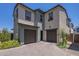 Charming two-story home featuring a two-car garage and a beautifully paved driveway at 9920 E Tamery Ave, Mesa, AZ 85212