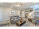 Comfortable living room with hardwood floors, stylish furnishings, and a cozy atmosphere at 9920 E Tamery Ave, Mesa, AZ 85212