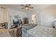 Spacious main bedroom features a comfortable queen-sized bed, TV, and ample storage throughout the room at 9920 E Tamery Ave, Mesa, AZ 85212