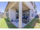 Inviting covered patio area with comfortable seating and natural light, great for outdoor living at 9920 E Tamery Ave, Mesa, AZ 85212