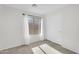 Neutral bedroom featuring ample natural light, closet space, and neutral carpet at 10304 E Plata Ave, Mesa, AZ 85212