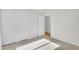 Bright bedroom featuring closet space and neutral carpet at 10304 E Plata Ave, Mesa, AZ 85212