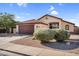 Charming home with manicured landscaping and a tiled roof at 10304 E Plata Ave, Mesa, AZ 85212