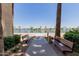 Peaceful view of the lake from a community walking path with benches to sit and relax at 10330 W Thunderbird Blvd # C109, Sun City, AZ 85351