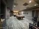 Spacious game room featuring a classic billiards table and elegant decor for leisure and social gatherings at 10330 W Thunderbird Blvd # C109, Sun City, AZ 85351