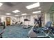 Well-equipped fitness center with modern exercise equipment, including treadmills and stationary bikes at 10330 W Thunderbird Blvd # C109, Sun City, AZ 85351