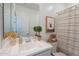 Charming bathroom featuring a white vanity, modern fixtures, and stylish decorative accents at 1055 W Diamondback Dr, Chandler, AZ 85286