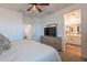 Bedroom with ensuite bathroom that features a modern layout and fixtures at 1055 W Diamondback Dr, Chandler, AZ 85286