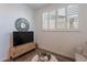 Stylish living space with modern furniture, decor, and natural light through window shutters at 1055 W Diamondback Dr, Chandler, AZ 85286