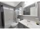 This is a standard bathroom with shower and a single sink at 11446 N 109Th St, Scottsdale, AZ 85259