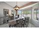 The dining area features views to the backyard and plenty of space for entertaining at 11446 N 109Th St, Scottsdale, AZ 85259