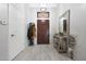 Well-lit foyer with stylish decor and a welcoming atmosphere at 11446 N 109Th St, Scottsdale, AZ 85259