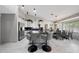Modern kitchen featuring an island, granite countertops, and stainless steel appliances at 11446 N 109Th St, Scottsdale, AZ 85259