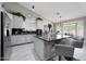 Bright, updated kitchen with an island, bar seating, and ample counter space at 11446 N 109Th St, Scottsdale, AZ 85259