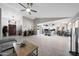 Bright, open-concept living area with vaulted ceilings and modern flooring at 11446 N 109Th St, Scottsdale, AZ 85259