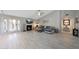 Cozy living room features a fireplace and French doors leading to outdoor space at 11446 N 109Th St, Scottsdale, AZ 85259