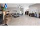 Spacious living room with vaulted ceilings, wood-look floors and modern furniture at 11446 N 109Th St, Scottsdale, AZ 85259