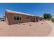 Spacious backyard with a covered patio, ideal for outdoor entertaining and enjoying the desert climate at 1341 E Bellerive Dr, Chandler, AZ 85249