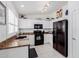 Efficient kitchen with ample counter space and stainless steel refrigerator at 1341 E Bellerive Dr, Chandler, AZ 85249