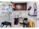 Home office with ample storage, built-in desk, overhead cabinets, and a cozy workspace at 1341 E Bellerive Dr, Chandler, AZ 85249