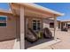 Inviting covered patio area perfect for outdoor seating and relaxation with desert landscaping at 1341 E Bellerive Dr, Chandler, AZ 85249
