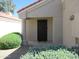 Inviting front entrance with a security door and manicured landscaping at 1450 E Laurel Ave, Gilbert, AZ 85234