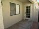 Private patio area with access door and window at 1450 E Laurel Ave, Gilbert, AZ 85234