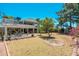 Expansive backyard with a spacious covered patio, perfect for outdoor entertaining and relaxation at 14622 N 45Th Pl, Phoenix, AZ 85032