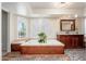 Bright bathroom featuring a soaking tub with a window view, and a vanity with granite countertop at 14622 N 45Th Pl, Phoenix, AZ 85032